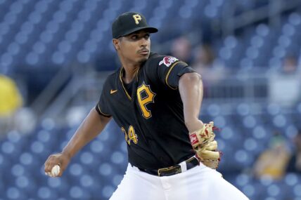 Pittsburgh Pirates starting pitcher Johan Oviedo delivers against the St. Louis Cardinals in the first inning of a baseball game in Pittsburgh, Tuesday, Aug. 22, 2023. (AP Photo/Matt Freed)