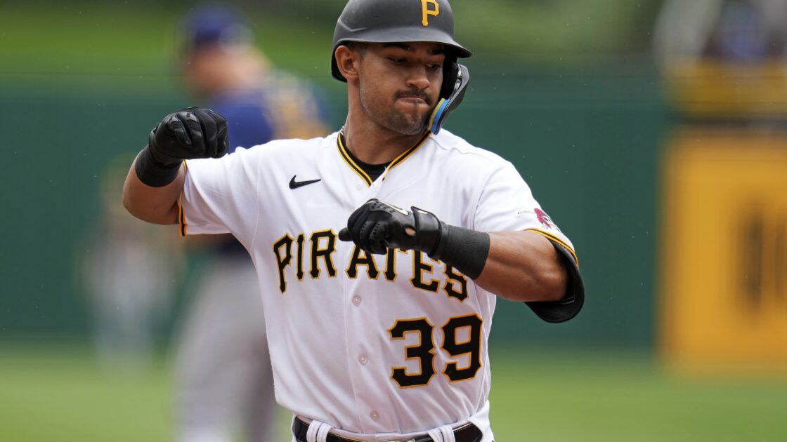 Pittsburgh Pirates' Nick Gonzales celebrates as he crosses home plate after hitting a two-run home run off Milwaukee Brewers starting pitcher Colin Rea during the second inning of a baseball game in Pittsburgh, Sunday, July 2, 2023. (AP Photo/Gene J. Puskar)