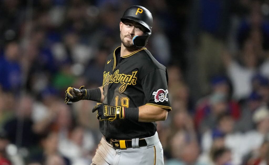 Pittsburgh Pirates' Jared Triolo scores during a baseball game against the Chicago Cubs Thursday, Sept. 21, 2023, in Chicago. (AP Photo/Charles Rex Arbogast)
