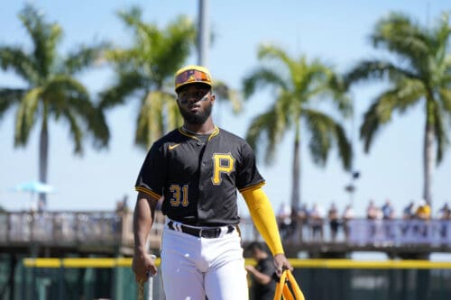 Pittsburgh Pirates second baseman Liover Peguero (31) walks on the field before a spring training baseball game against the Atlanta Braves Tuesday, Feb. 27, 2024, in Bradenton, Fla. (AP Photo/Charlie Neibergall)