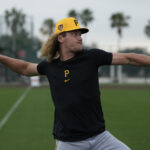 Pittsburgh Pirates pitcher Braxton Ashcraft throws during a baseball spring training workout Saturday, Feb. 17, 2024, in Bradenton, Fla. (AP Photo/Charlie Neibergall)