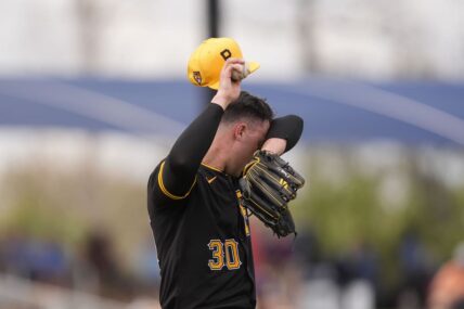 Pittsburgh Pirates pitcher Paul Skenes (30) wipes his brow on the mound in the fifth inning of a spring training baseball game against the Tampa Bay Rays in Port Charlotte, Fla., Monday, March 4, 2024. (AP Photo/Gerald Herbert)