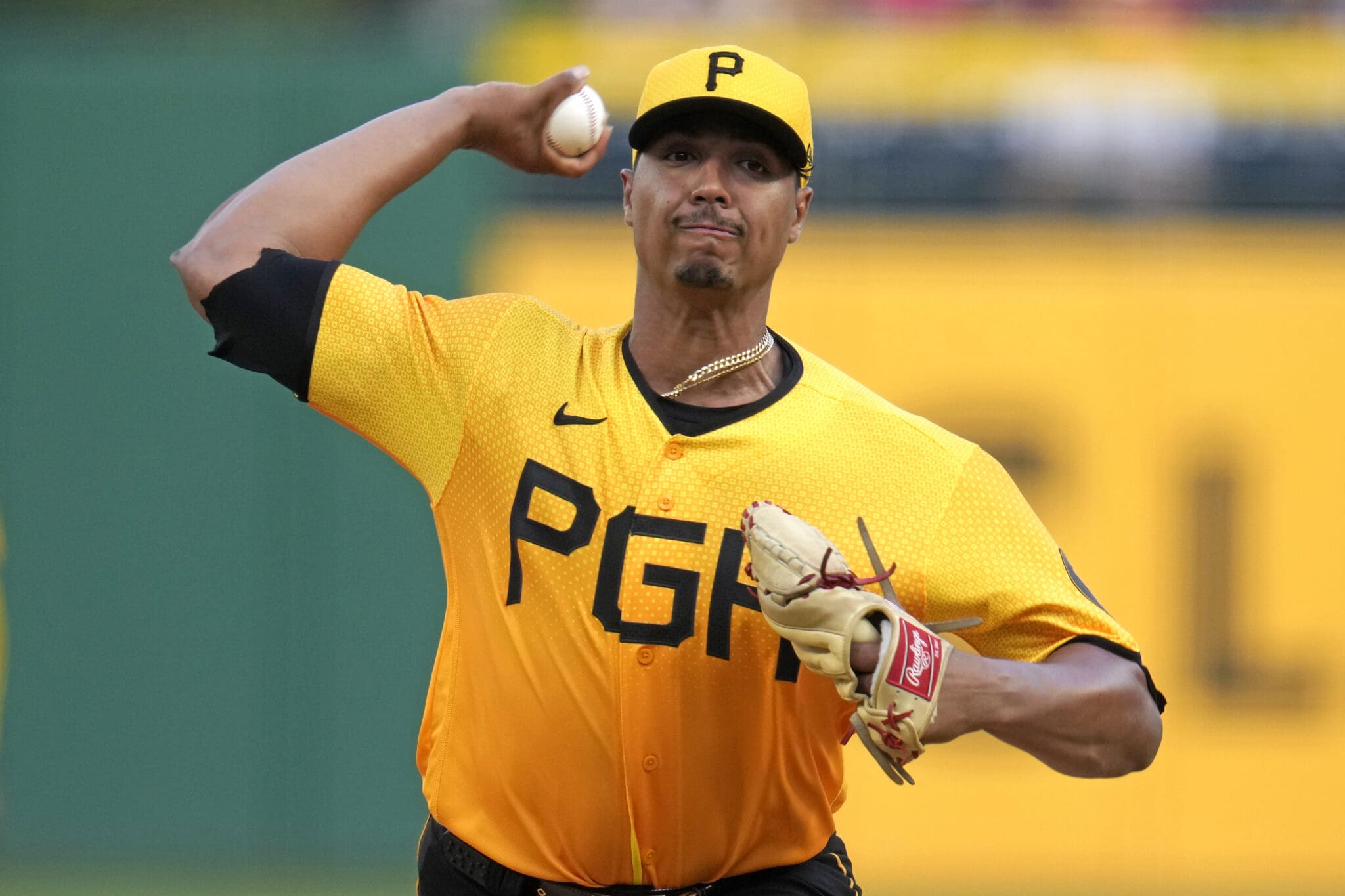 Pittsburgh Pirates starting pitcher Johan Oviedo delivers during the first inning of the team's baseball game against the Cincinnati Reds in Pittsburgh, Friday, Aug. 11, 2023. (AP Photo/Gene J. Puskar)