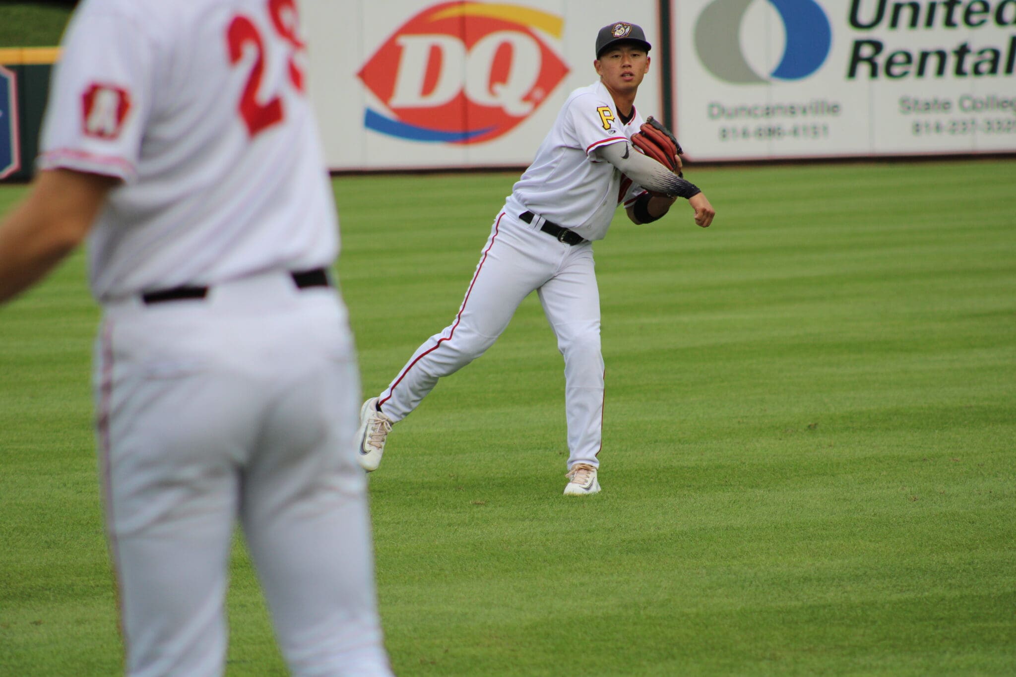 Pirates minor league infielder Tsung-Che Cheng makes a throw.