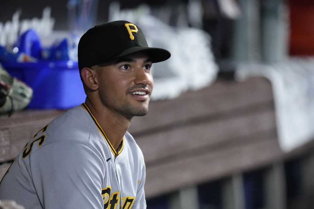 Pittsburgh Pirates second baseman Nick Gonzales looks out of the dugout before the start of a baseball game against the Miami Marlins, Friday, June 23, 2023, in Miami. (AP Photo/Wilfredo Lee)